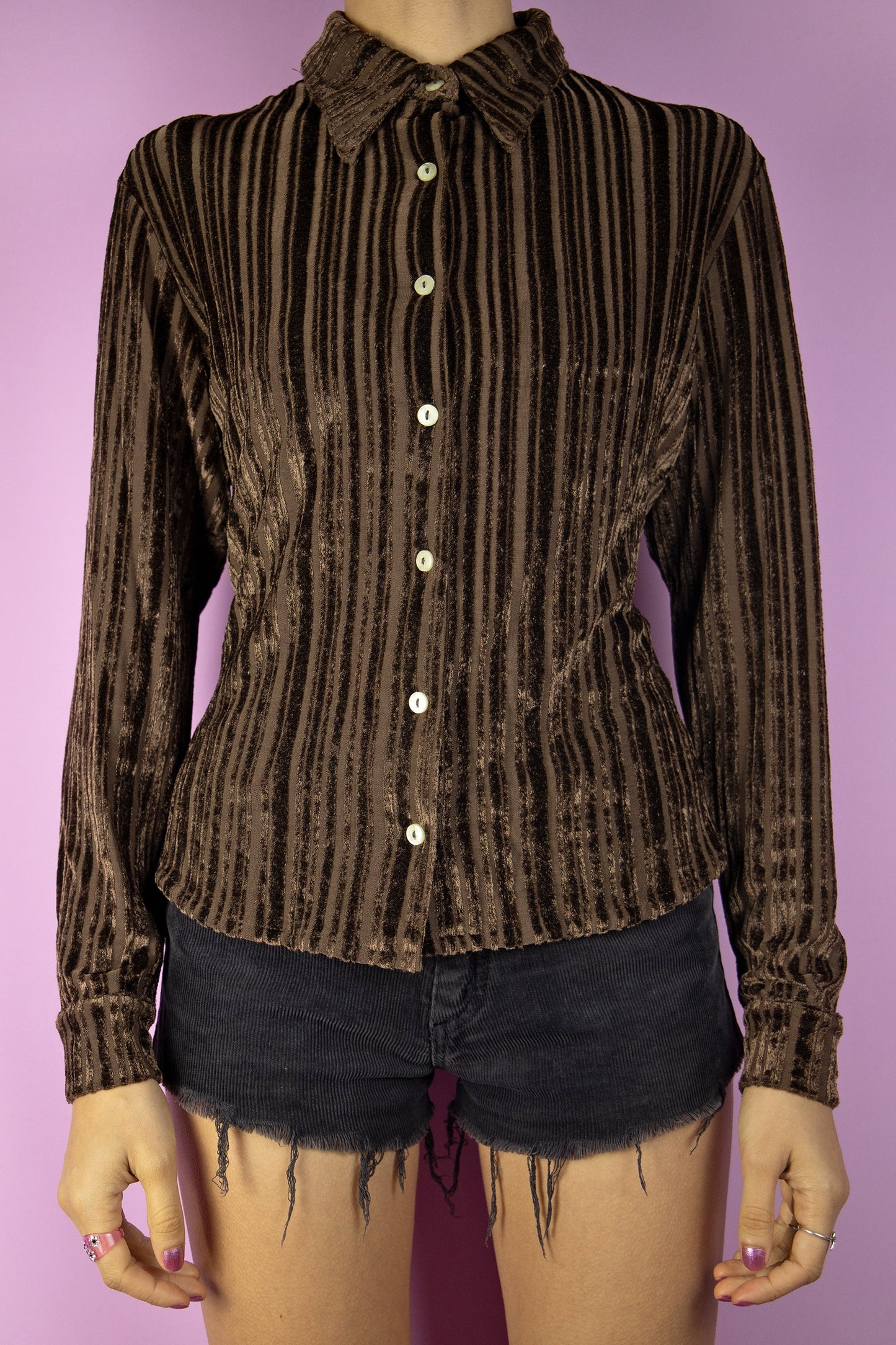 The Vintage 90's Brown Velvet Shirt is a striped stretch dark brown velvet top. This cute boho grunge dark academia blouse is from the 1990s.