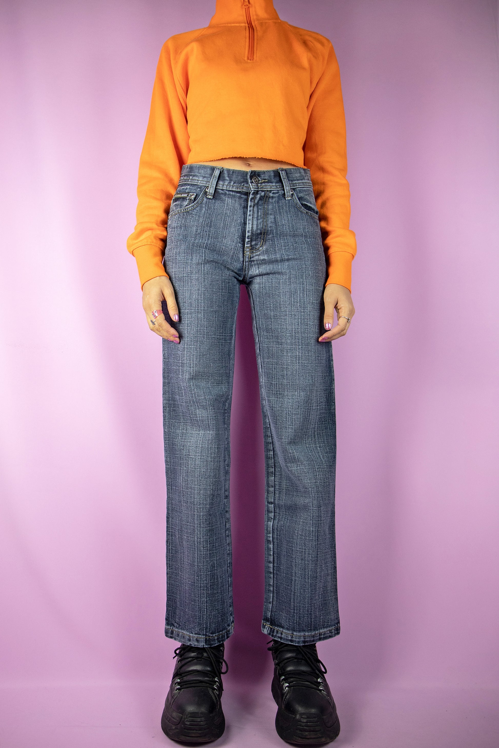 The Y2K Mid Rise Wide Jeans are dark wash mid-rise wide-leg pants. Cyber grunge gorpcore 2000s denim trousers.