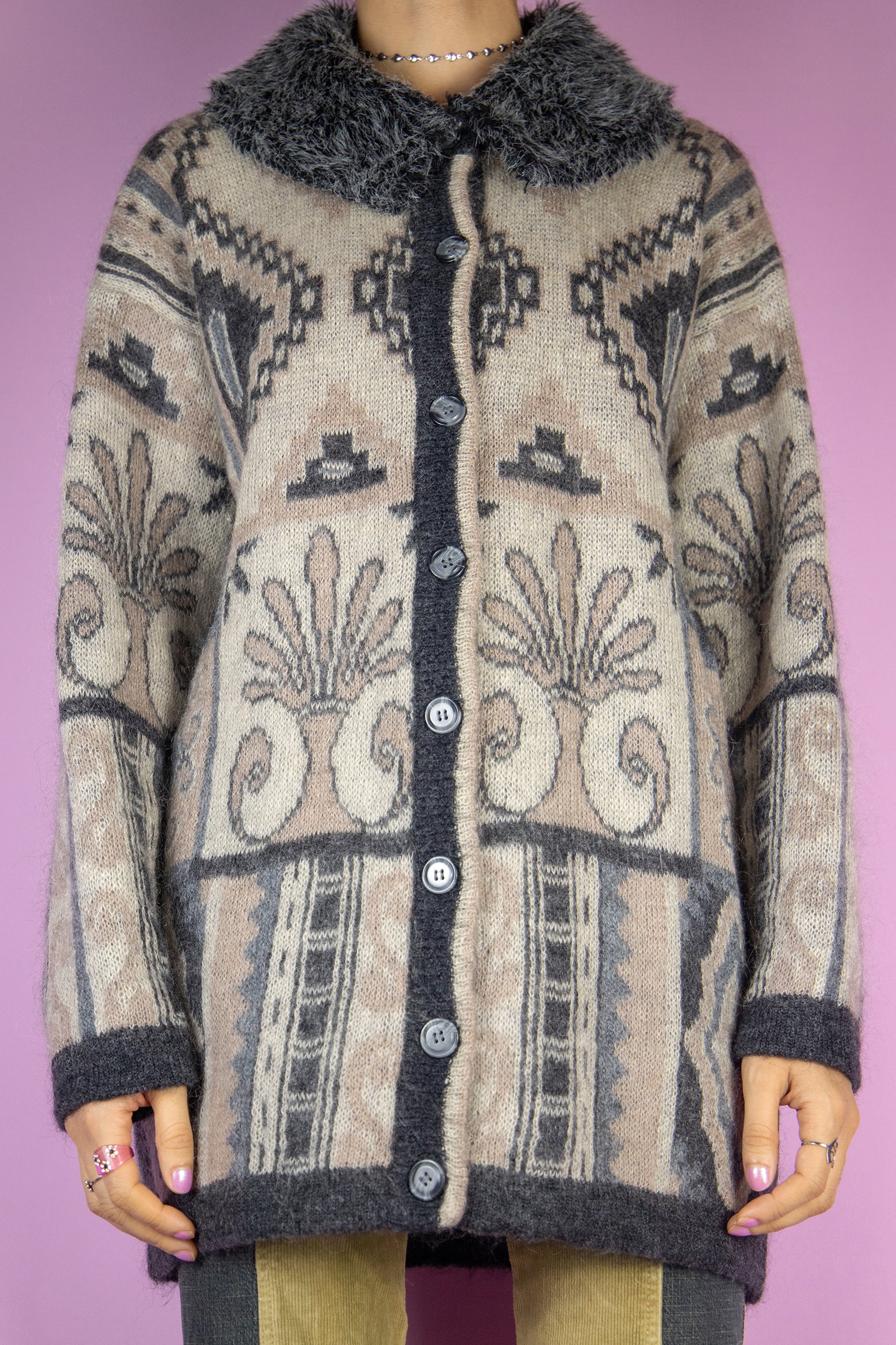 The Vintage 90s Faux Fur Cardigan is a gray and beige abstract pattern long cardigan made from a mohair blend with buttons and a faux fur collar. Looks cute when worn oversized. Lovely boho retro 1990s oversized sweater.