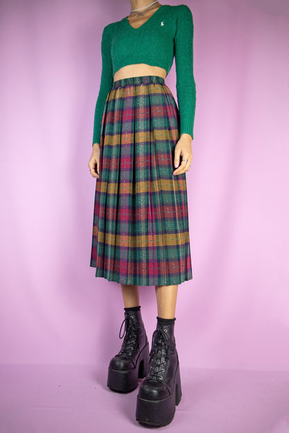 The Vintage 90s Plaid Pleated Midi Skirt is a long green, maroon and mustard check pleated skirt with an elasticated waist. Super cute classic preppy style 1990s skirt.