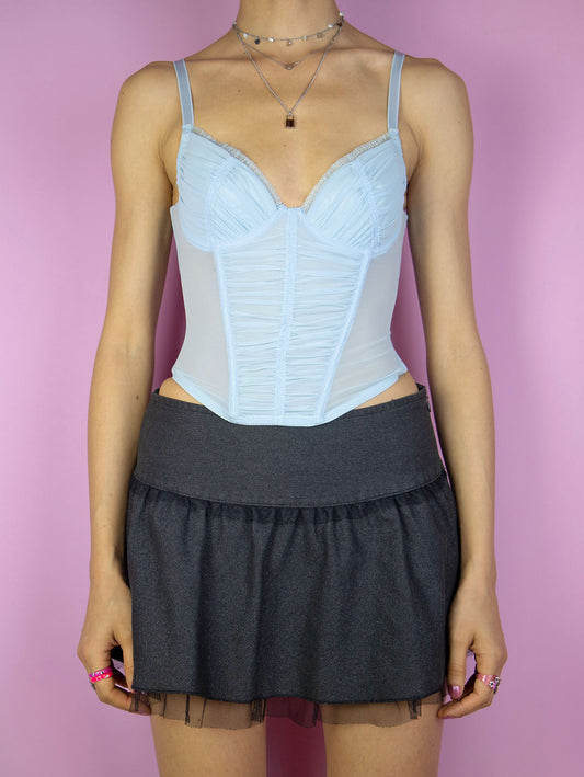 The Y2K Blue Mesh Corset Top is a vintage 2000s romantic coquette pastel light blue semi-sheer ruched lingerie bustier with adjustable straps and back hook closure.