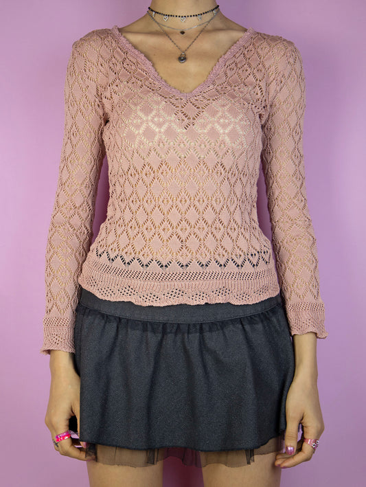 The Y2K Pink Crochet Knit Top is a vintage dusty pink long sleeved v-neck top. Lovely romantic fairy grunge 2000s sweater.