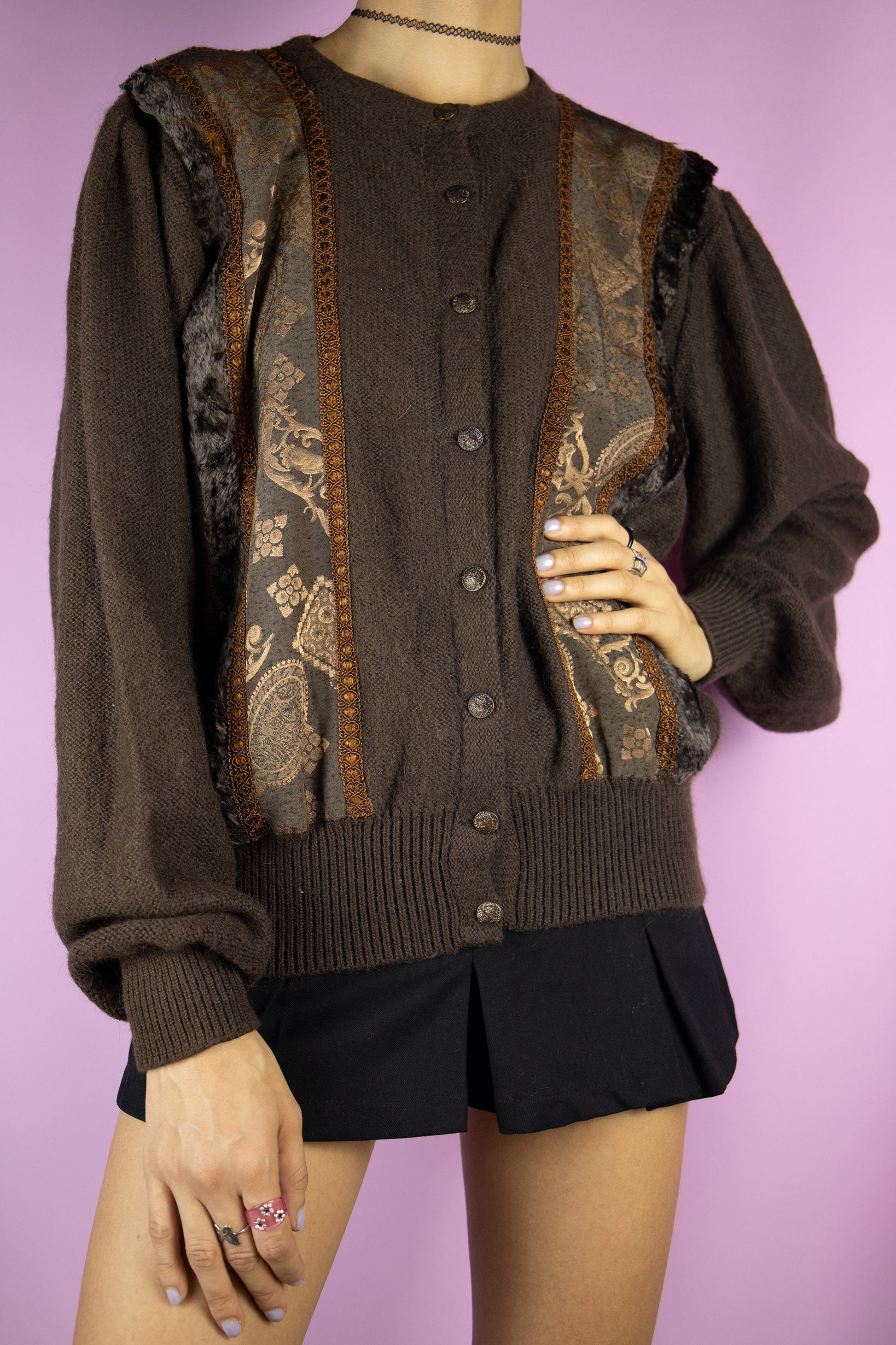 The Vintage 90s Brown Puff Sleeve Cardigan is a dark brown mohair blend cardigan with embroidered and faux fur details and puff sleeves. Boho fairy grunge 1990s knitted sweater.