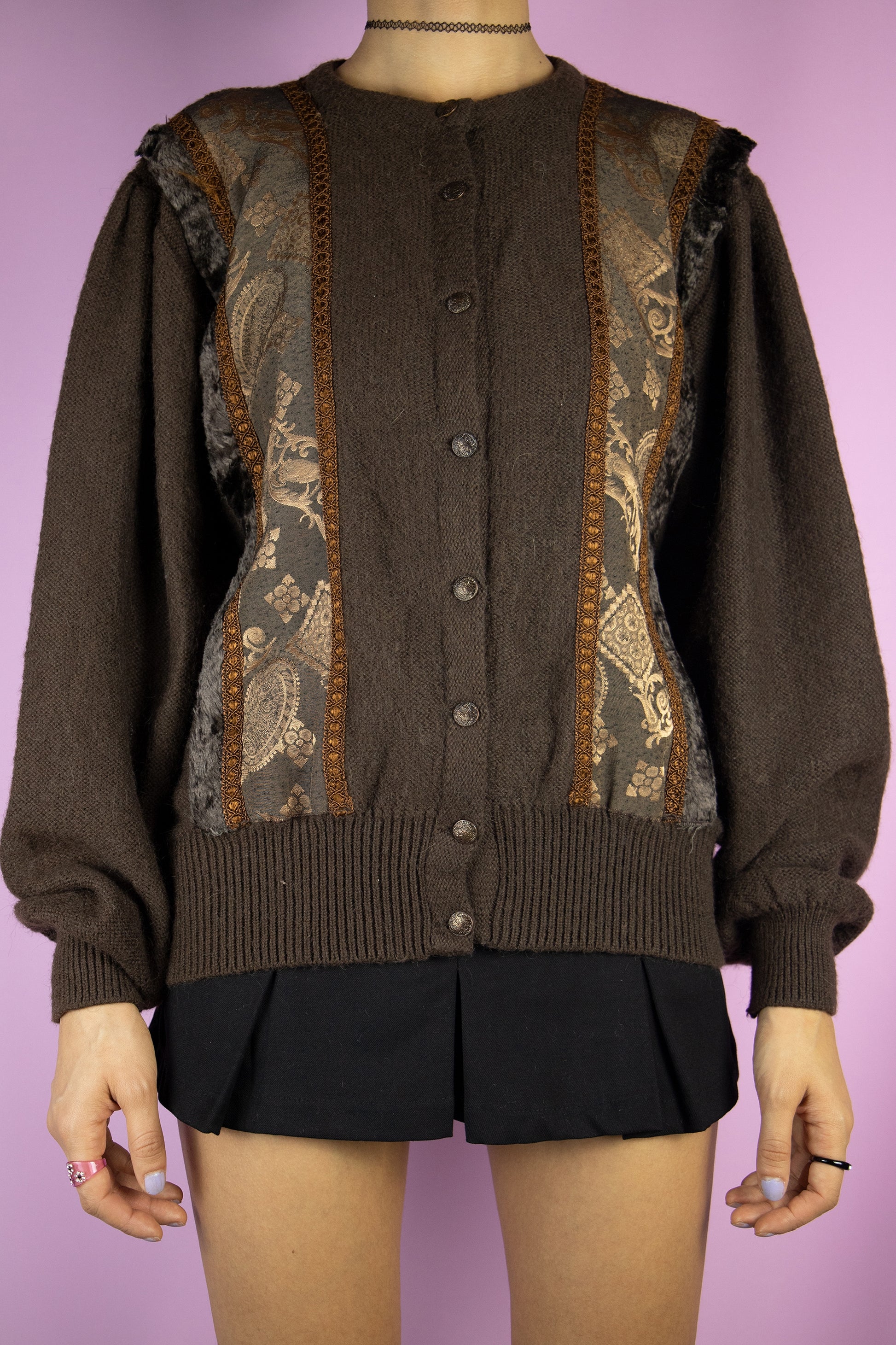 The Vintage 90s Brown Puff Sleeve Cardigan is a dark brown mohair blend cardigan with embroidered and faux fur details and puff sleeves. Boho fairy grunge 1990s knitted sweater.